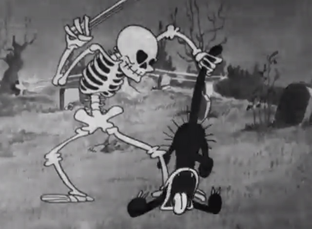 The Skeleton Dance - black cat yowling as skeleton steps on him