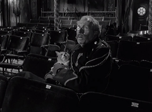 The Smallest Show on Earth - Bernard Miles Old Tom holding long haired calico cat in movie theater