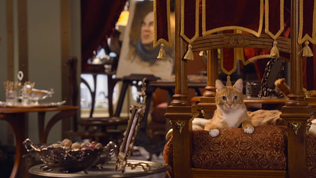 The Smurfs 2 - Azrael cat on cushioned bed in hotel room