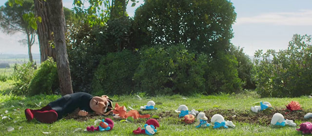 Smurfs - Gargamel lying on ground with orange and white cat Azrael and Smurfs after crashing