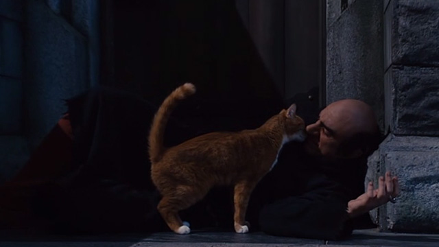The Smurfs movie - Azrael cat and Gargamel Hank Azaria in alley