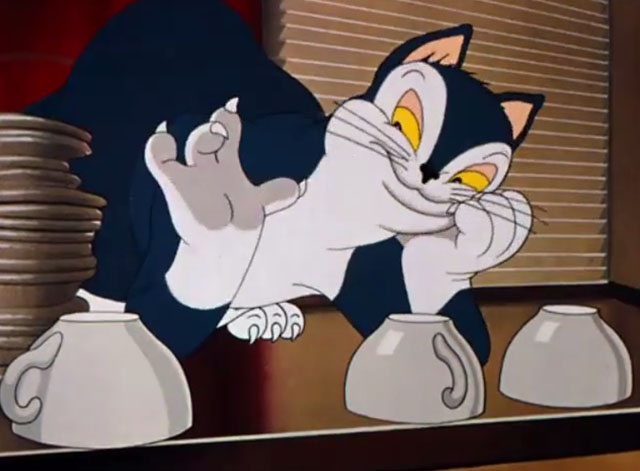 Sniffles Bell the Cat - blue and white cartoon cat trying to decide which teacup to lift