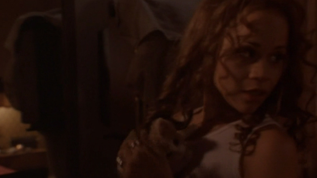 Somebody to Love - Mercedes Rosie Perez holding ginger tabby kitten