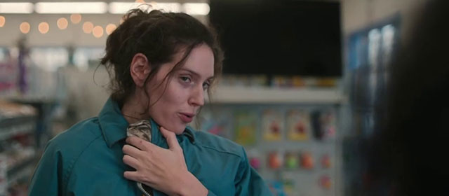 Sorry, Baby - Agnes Eva Victor holding gray tabby kitten Olga Noochie in jacket in grocery store