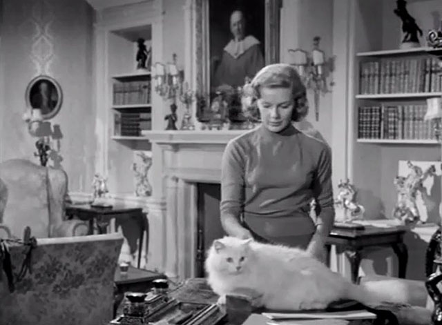 The Spaniard's Curse - Margaret Susan Beaumont Manton with white longhair cat on desk
