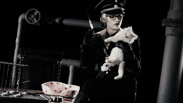The Spirit - Silken Floss Scarlett Johansson holding white long-haired kitten Muffin and hypodermic needle