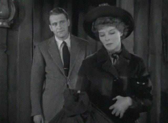 Spitfire - black cat Zedrack in Trigger's arms as she leaves