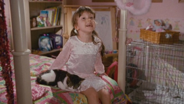 The Spy Next Door - cat Ringo on bed with Nora Alina Foley