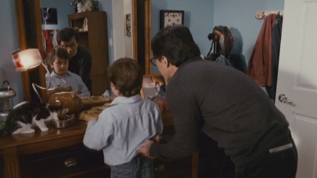 The Spy Next Door - cat Ringo on dresser beside Ian Will Shadley and Bob Jackie Chan