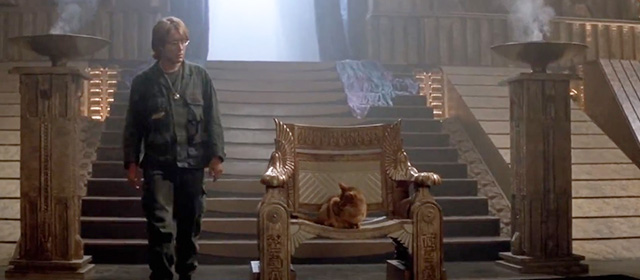 Stargate - Abyssinian cat sitting on throne as Daniel James Spader approaches