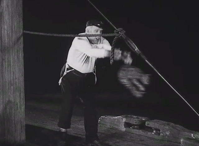 Steamboat Bill, Jr. - first and last mate Tom Lewis tossing tabby cat on deck
