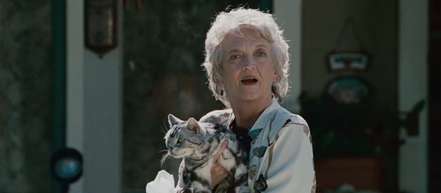 The Stepfather - Mrs. Cutter Nancy Linehan Charles holding British shorthair cat outside