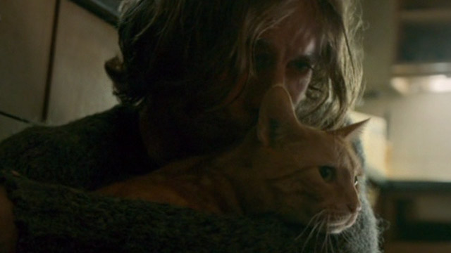 A Street Cat Named Bob - James Bowen Luke Treadway hugging orange tabby Bob