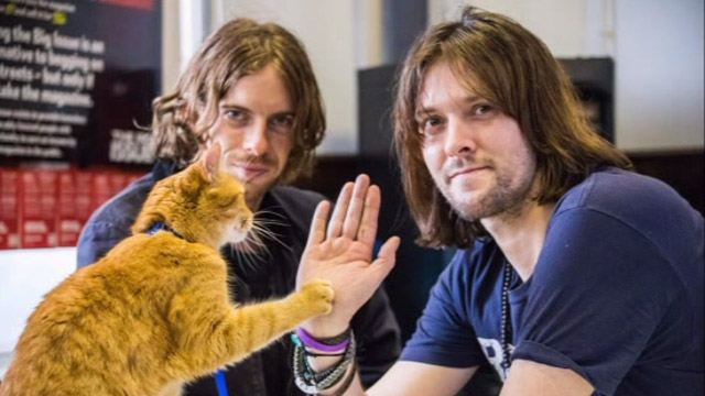 A Street Cat Named Bob - James Bowen and Luke Treadway with tabby Bob at book signing