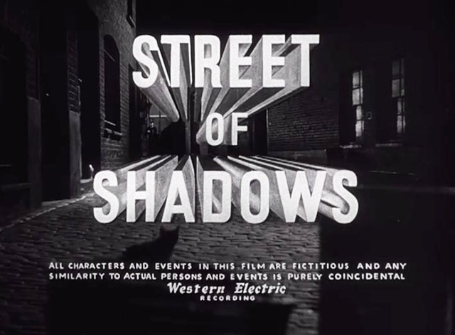 Street of Shadows - black cat walking on cobbled street in front of trash can under opening credits