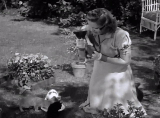 Strike Up the Band - Mary Judy Garland picking up tuxedo kitten