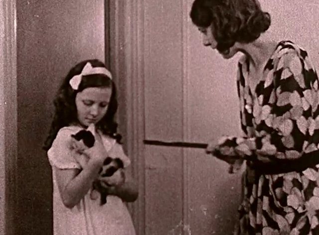 Struggle for Individuality Children Grow Up - Mrs. Stevens scolding Margaret for bringing home white kitten with black markings