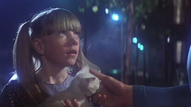 Superman - Superman petting white cat Frisky in little girl's Jayne Tottman arms