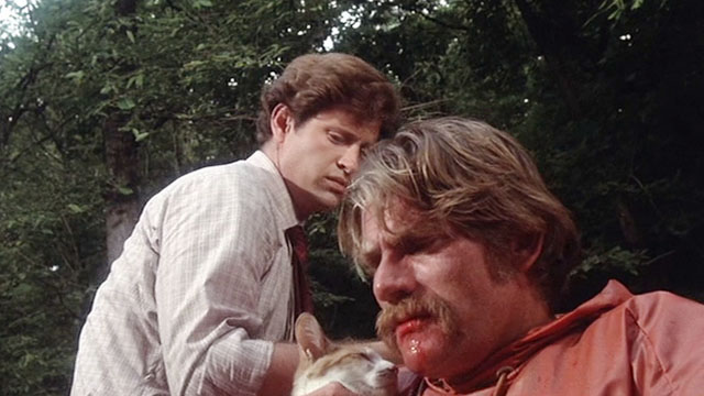 Take This Job and Shove It - Frank Robert Hays with Ray Tim Thomerson holding sleeping ginger and white tabby cat