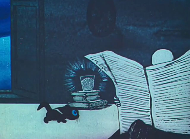 Tale of Moonlight - Shazka pro lunnyy svet - cartoon black kitten on table with man reading newspaper