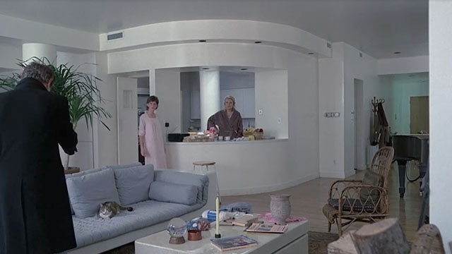Tempest - calico tabby cat on couch with Philip John Cassavetes, Miranda Molly Ringwald and Antonio Gena Rowlands