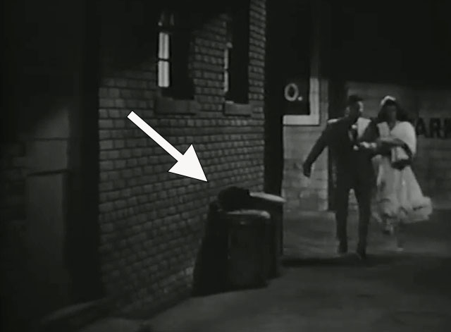 That's the Spirit - Slim Jack Oakie and Sheila Peggy Ryan in alley with black cat on trash can