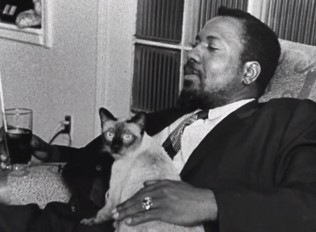 Thelonious Monk: Straight No Chaser - photo holding Siamese cat