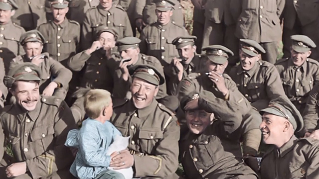 They Shall Not Grow Old - British soldiers with boy and white cat