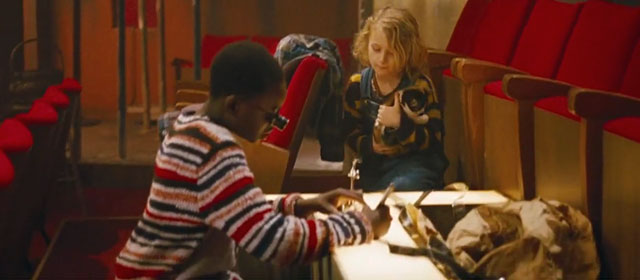 The Thief Lord - Bo Jasper Harris holding calico kitten with Mosca Lathaniel Dyer