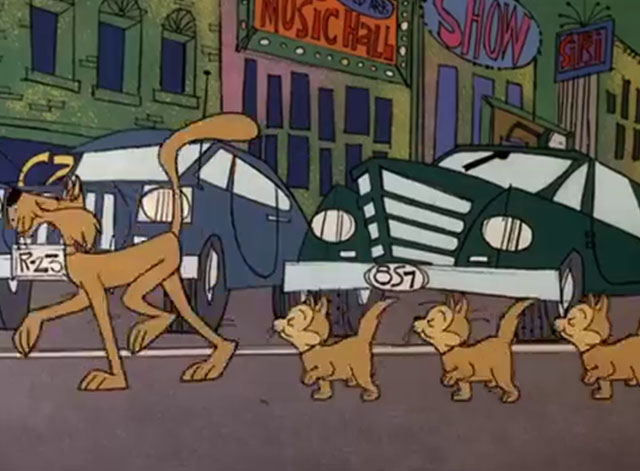 Think Before You Pink - large brown cartoon cat leading three kittens across street