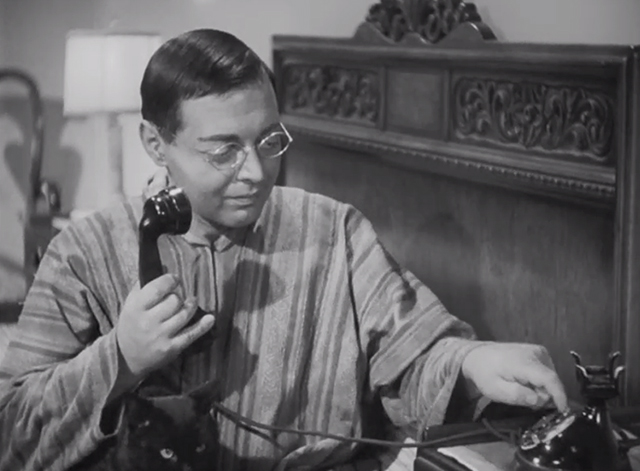 Think Fast, Mr. Moto - Mr. Moto Peter Lorre making telephone call with black cat Chunkina on lap
