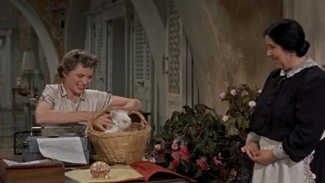 Three Coins in the Fountain - Frances lifts white Angora kitten from basket