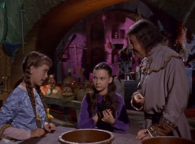 The Three Worlds of Gulliver - Shrike Waveney Lee holding black cat with Makovan Charles Lloyd Pack and Glumdalclitch Sherri Alberoni