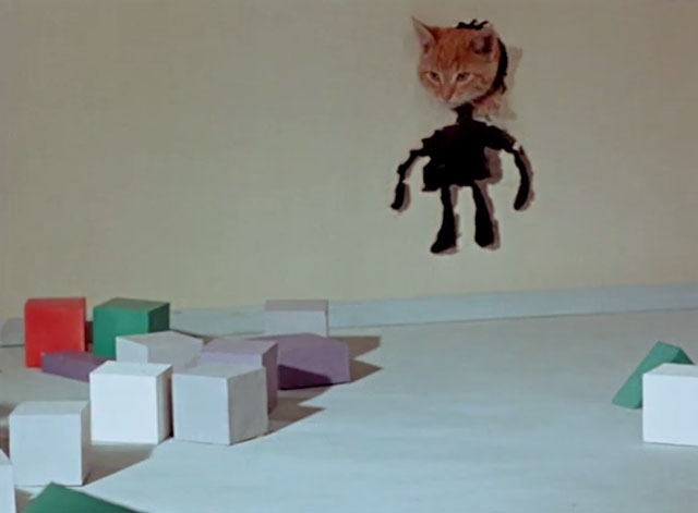 Tigeris Nau Nau - Tiger the Cat - ginger tabby cat poking head through boy cutout in wall