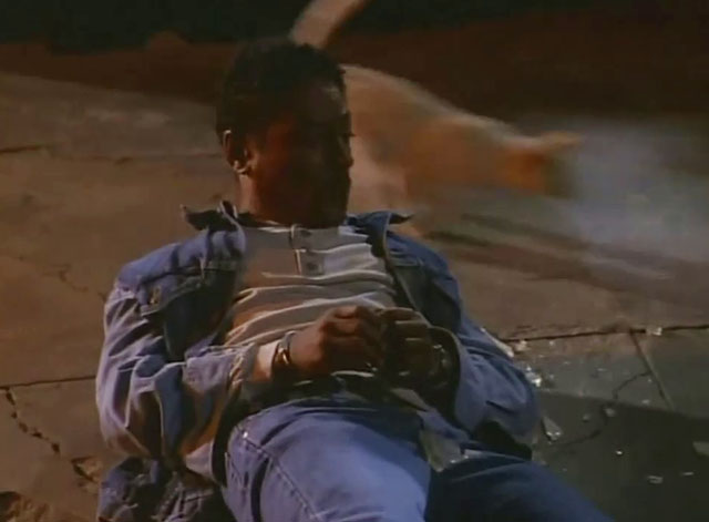 Tomorrow Man - white cat running behind Jonathan Giancarlo Esposito