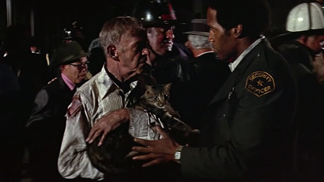 The Towering Inferno - tabby cat Elke being handed to Harlee Fred Astaire by Jernigan O.J. Simpson