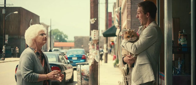 The Toxic Avenger - Daisy Annette Badland with Spence Abraham Lewis holding golden British shorthair cat Mr. Treats