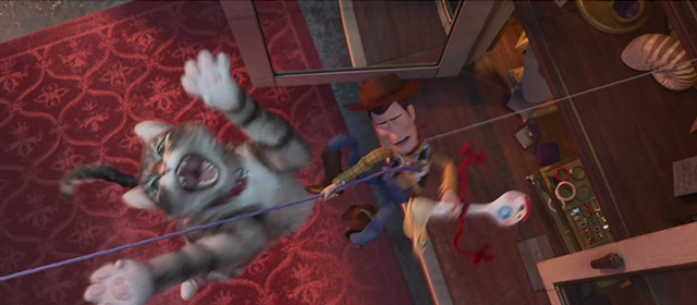 Toy Story 4 - tabby cat Dragon leaping up to catch Woody