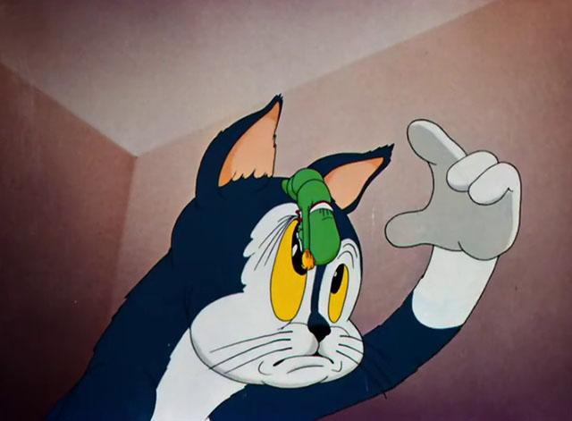 Toy Trouble - cartoon blue and white cat reaching up to take Bookworm from his head