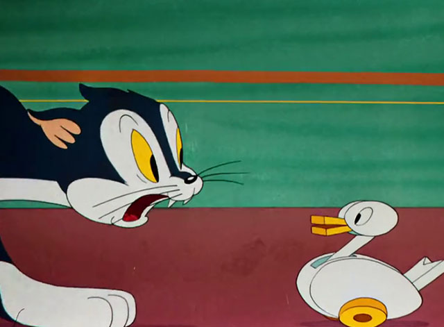 Toy Trouble - cartoon blue and white cat scared of toy duck