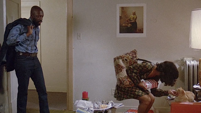 Truck Turner - ginger tabby cat Francis being greeted by Annie Annazette Chase with Isaac Hayes