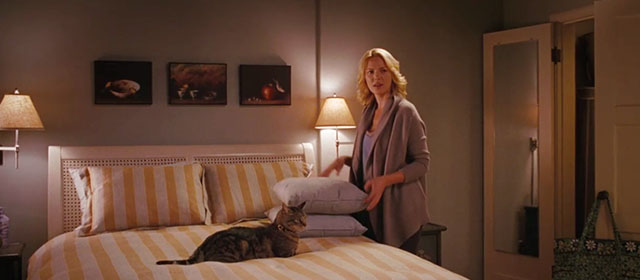 The Ugly Truth - Abby Katherine Heigl with brown tabby cat D'Artagnan on bed