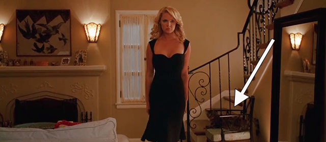 The Ugly Truth - Abby Katherine Heigl entering room in dress with brown tabby cat D'Artagnan on chair