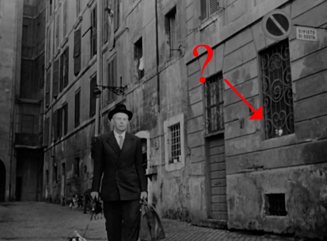 Umberto D - possible cat sitting in window