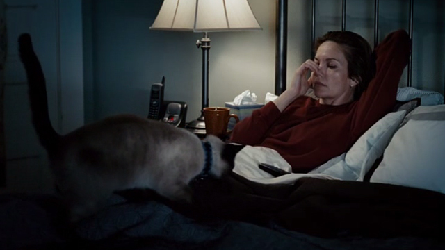 Untraceable - Siamese cat approaching Jennifer Marsh Diane Lane on bed