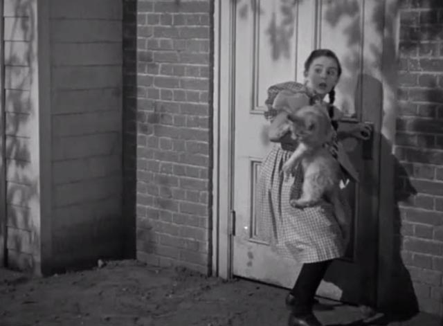 The Vanishing Virginian - Caroline Juanita Quigley putting white cat Tabitha through door