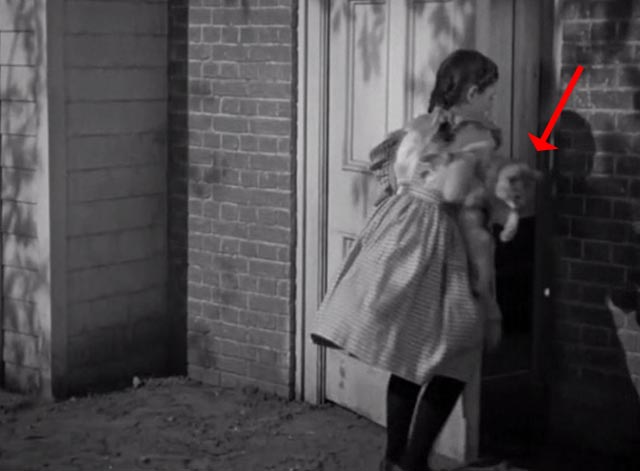 The Vanishing Virginian - Caroline Juanita Quigley putting white cat Tabitha through door