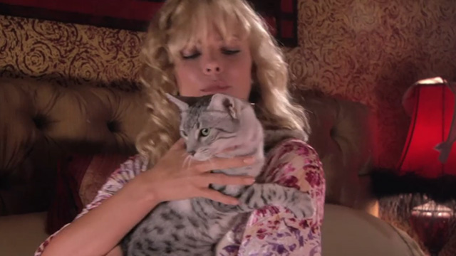 Venus & Vegas - Tara Jaime Pressly holding Mau cat