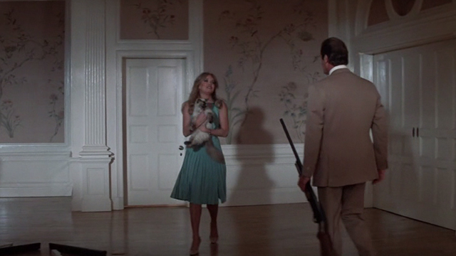 A View to a Kill - Himalayan cat Pussy carried by Stacey Tanya Roberts to kitchen with James Bond Roger Moore