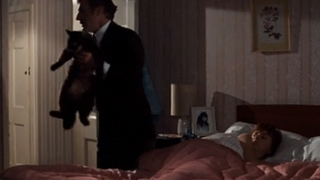 Villain - Bob Matthews Nigel Davenport carrying long haired tabby cat away from bed
